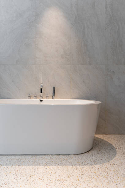 istock Bright, clean bathtub in bathroom 1404543983