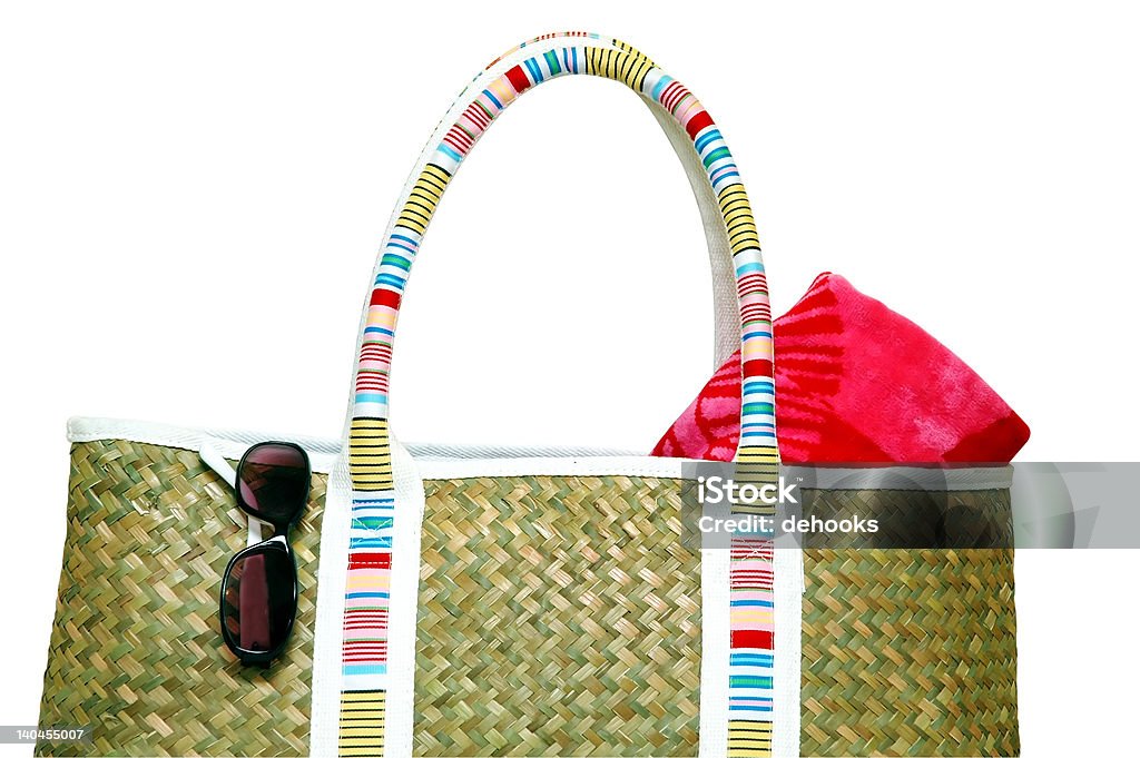 Beach Items Isolated Beach bag, towel, and sunglasses.  Isolated image with clipping path. Bag Stock Photo