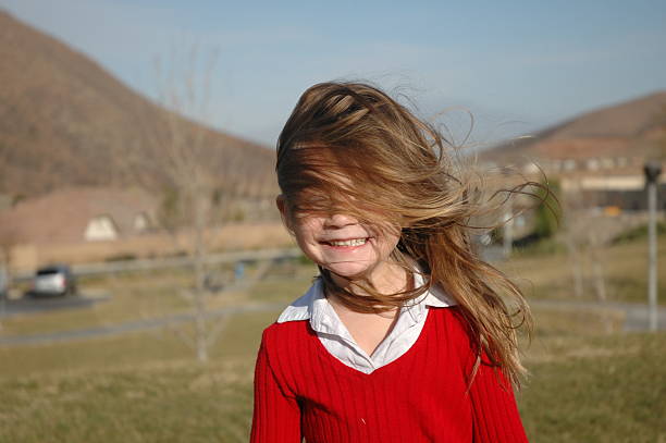 Standing in the wind stock photo