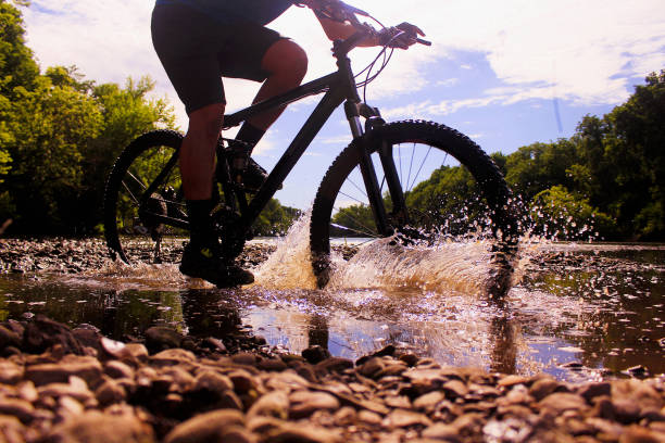 istock Mountain Bike Splashing Near River 1404552740