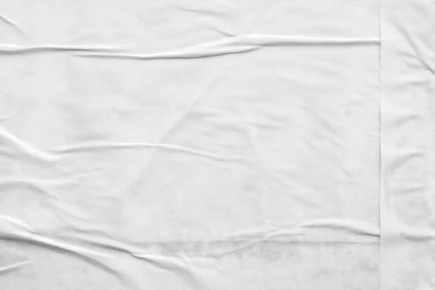 istock white crumpled and creased paper poster texture background 1404553385