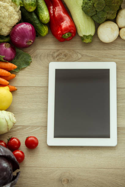 istock Digital tablet is an useful tool in preparing fresh recipes 1404553550