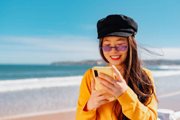 istock woman with smart phone 1404558139