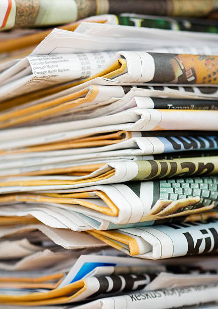istock Pile of newspapers 140456390