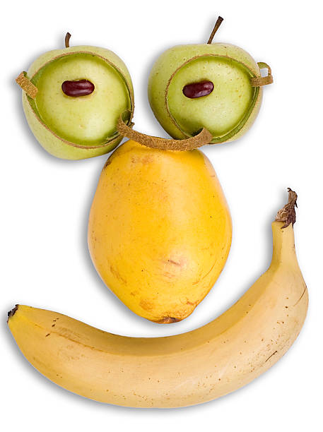 Intelligent face made of fruits stock photo