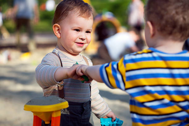 No parque infantil - fotografia de stock