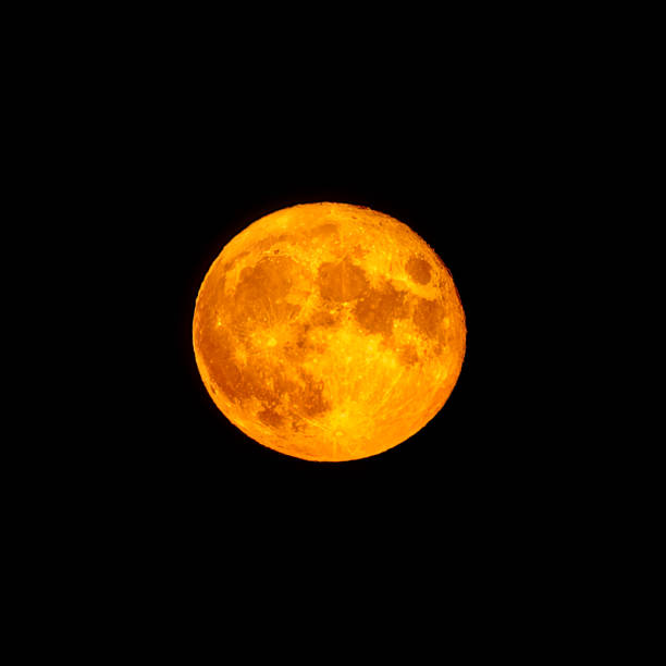 Red full moon in red color also called bloodmoon Bright orange and red fool moon over the sea. Red full moon in red color also called bloodmoon fool moon stock pictures, royalty-free photos & images