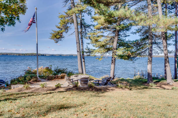 istock American flag at water's edge on a beautiful day 1404574808