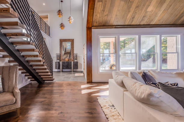 istock Modern home with open stairs leading up 1404574861