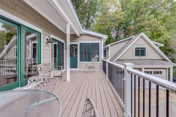 istock Elongated deck with glass table and chairs 1404575947