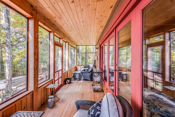istock Sunroom and deck combination in the woods 1404578134