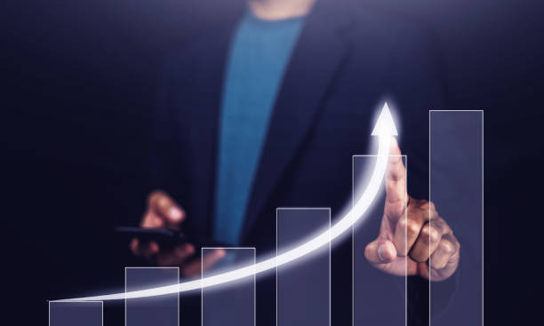 istock Businessman pointing arrow graph corporate future growth plan, Business development to success and growing growth concept, 1404578355