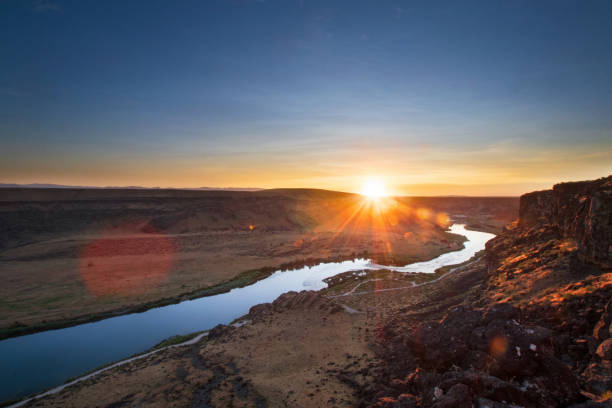 wunderschöner sonnenuntergang über dem snake river in idaho - snake river fotos stock-fotos und bilder