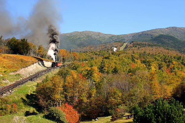 Mount Washington - Cog Railway The old cog train once again makes its climb up the side of Mount white mountains new hampshire stock pictures, royalty-free photos & images