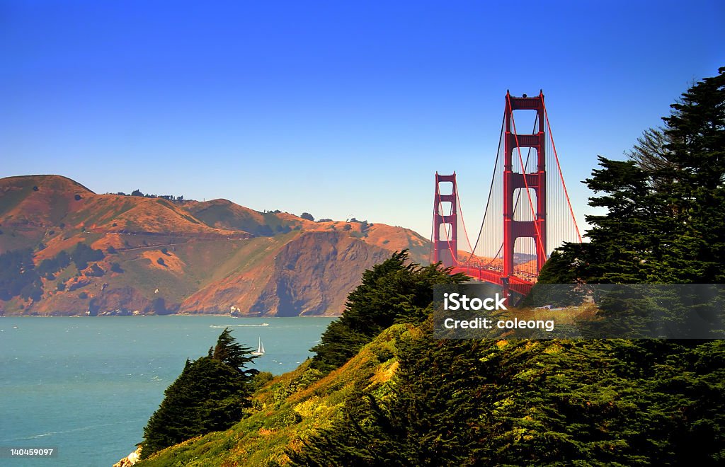 Beautiful day near Golden Gate Bridge against clear blue sky Golden Gate Bridge, San Francisco Architecture Stock Photo