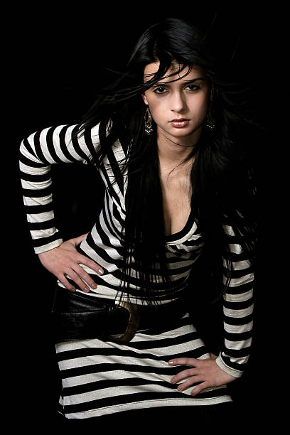 istock Girl in a white striped dress 140459111