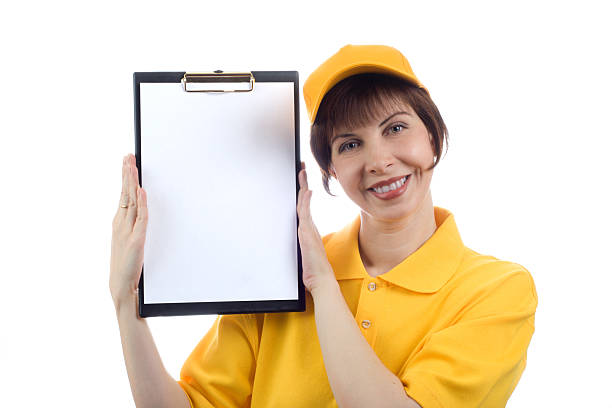 Young woman shows the blank page stock photo