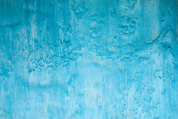 istock Paint washed grunge stucco wall background texture blue 140459808