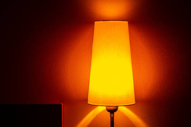Lit lamp in the dark