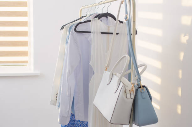istock female white and blue capsule summer wardrobe in  white room 1404603434