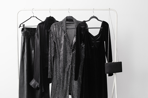 elegant black evening wear on a hanger
