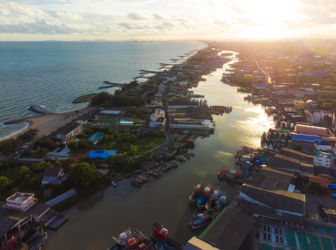 Aerial landscape view in the evening around Harbour village at Seang Chan Beach, Rayong, Thailand