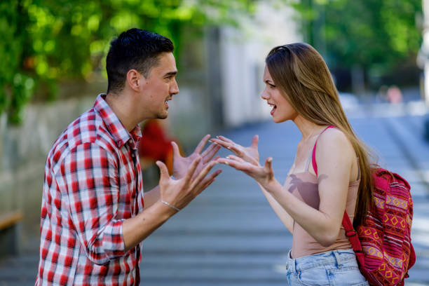 istock Couple having a quarrel outside 1404607395
