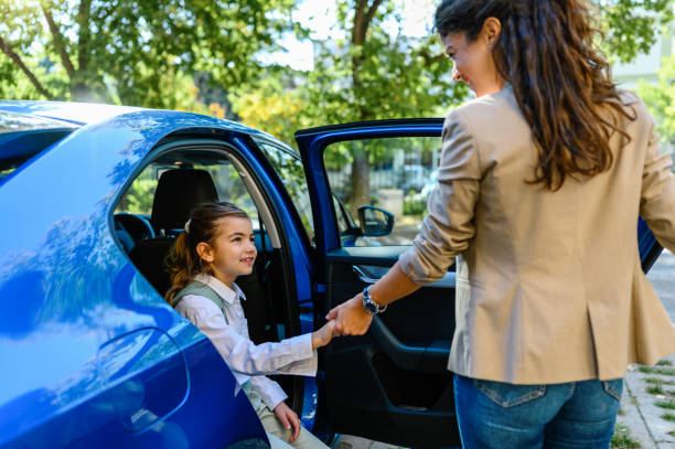 istock Mother taking her daughter to school 1404608162