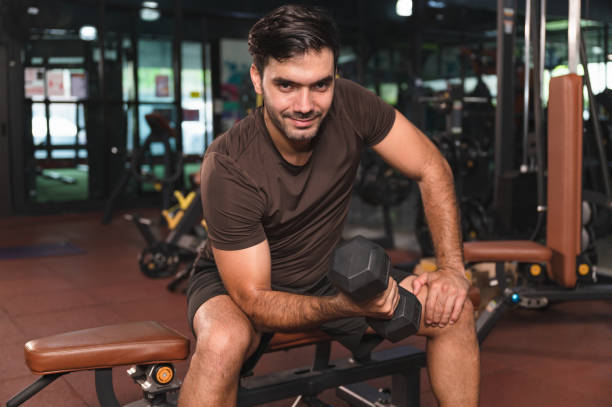 istock Portrait handsome caucasian man with dumbbell 1404608589