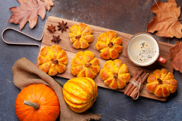 istock Pumpkin muffins and various pumpkins 1404609723