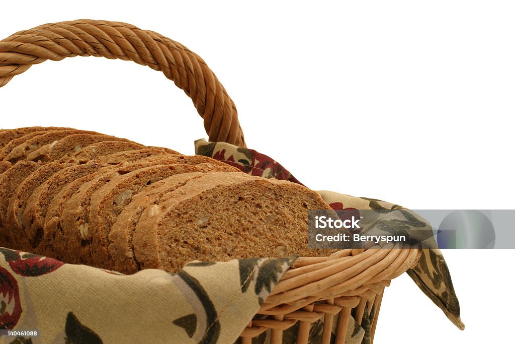 Hearty Bread Slices - close-up Multi grain loaf in a basket.  Homemade with 100% organic ingredients Baked Stock Photo