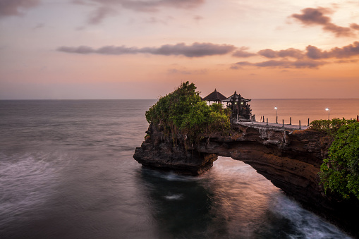 Tanah Lot Temple (Tanah Lot Temple) in silhouette sunset time, Bali, Indonesia