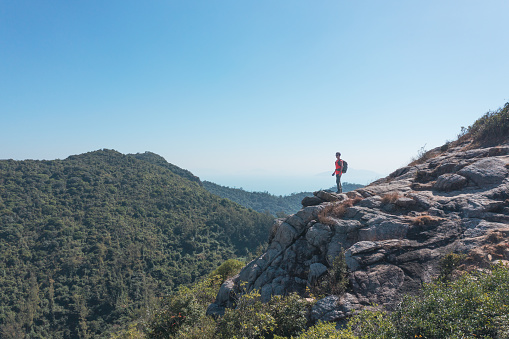 Outdoor Hiking Man on the mountain of Lantau Islan, Hong Kong