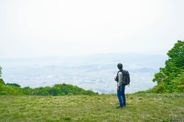 istock Asian woman walking on the trail. 1404614388