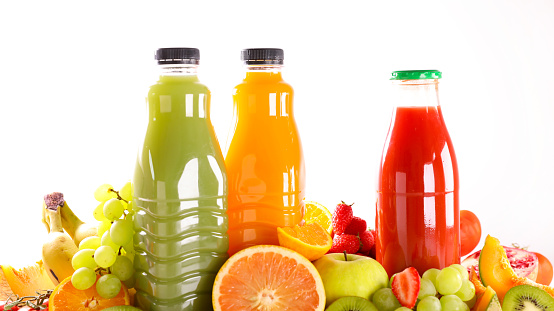 bottles of fruit juice- smoothie with fresh fruit