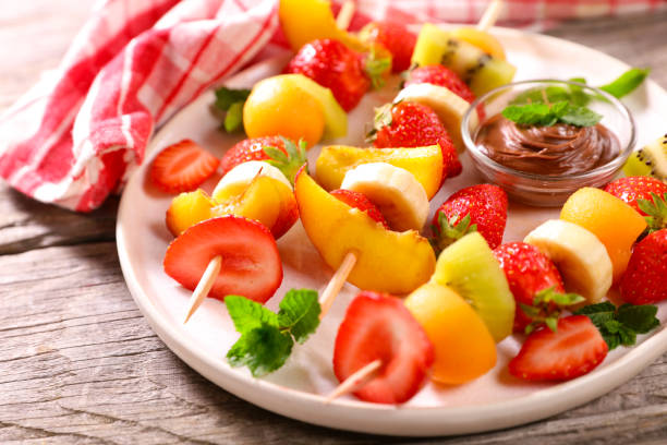 istock summer fruit skewer and chocolate sauce 1404615287