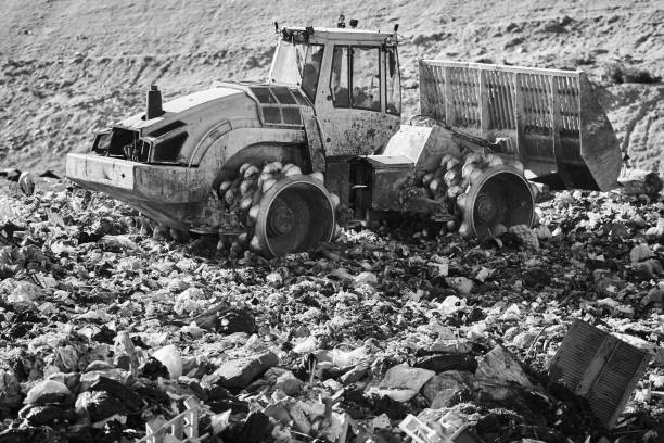 Work of a bulldozer at a landfill