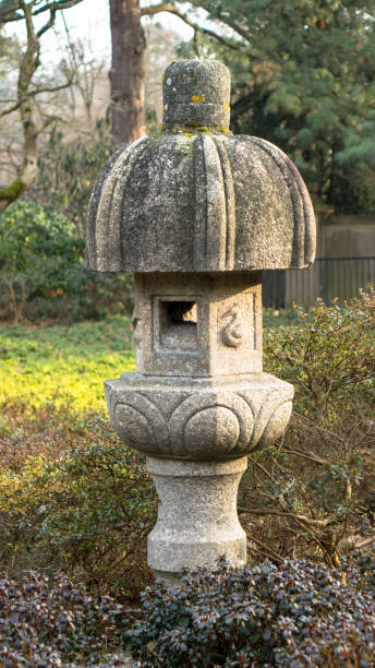 istock Light tower traditional lantern made of stone. 1404619104