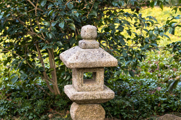 istock Light tower traditional lantern made of stone. 1404619107