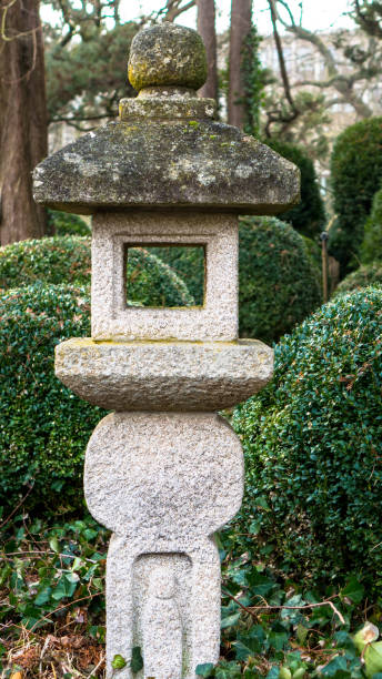 istock Light tower traditional lantern made of stone. 1404619108