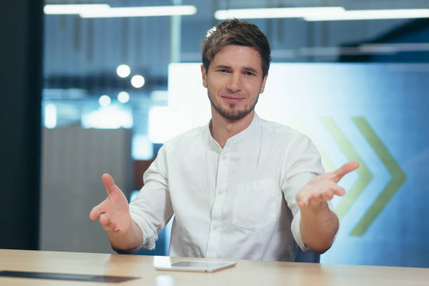 istock Man in office working surprised looking at webcam web, online conference with colleagues 1404622518