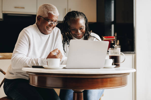 istock Cheerful senior couple having a video call on a laptop 1404625134