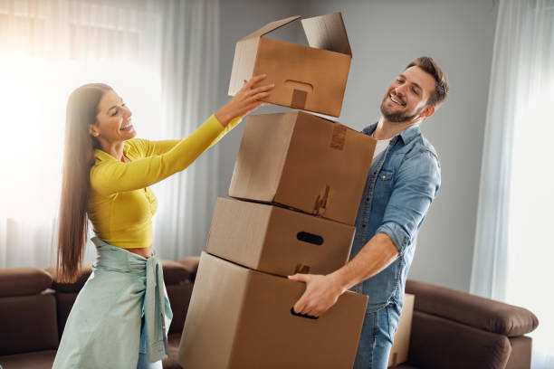 istock Young couple moving in new home 1404626679