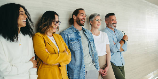 istock Successful business team laughing cheerfully in an office 1404626937