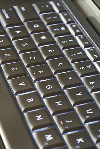 Laptop Keyboard Backlit Low Light stock photo