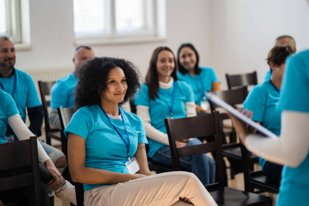 istock Multiethnic group of voluntary workers in a meeting 1404628053