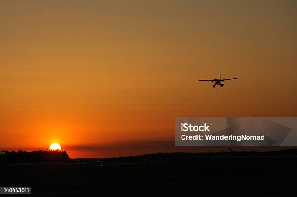 Flying Into The Sunset Stock Photo - Download Image Now - Sunset, Taking Off - Activity, Aerospace Industry