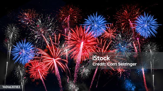 istock USA america united states new year or Independence Day celebration holiday background greeting card - Blue red white firework on dark night sky 1404630183