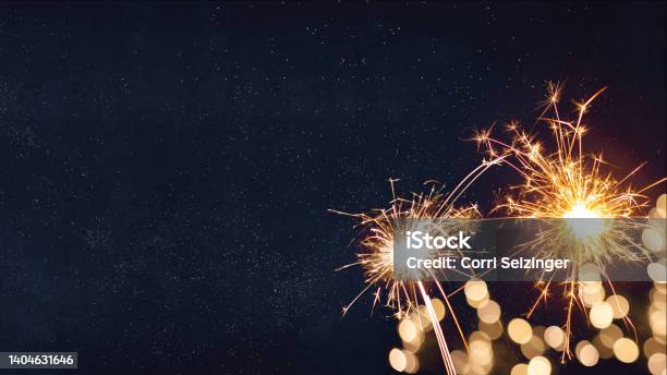 Silvester New Years Eve 2023 Party New Year Fireworks Firework Background Banner Panorama Long Sparklers And Bokeh Lights On Dark Blue Night Sky Stock Photo - Download Image Now