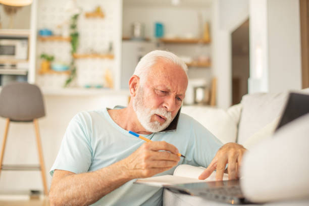 istock Senior man working at home 1404635249